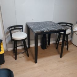 Table And Two Metal Bar Chairs 