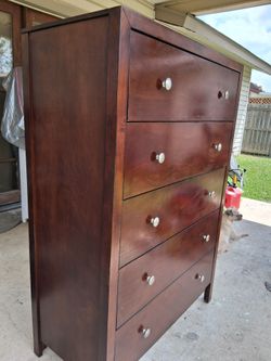 Brown wood dresser  - 53" x 35"