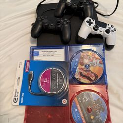 PS4 Set With 3 Controllers And Two Games