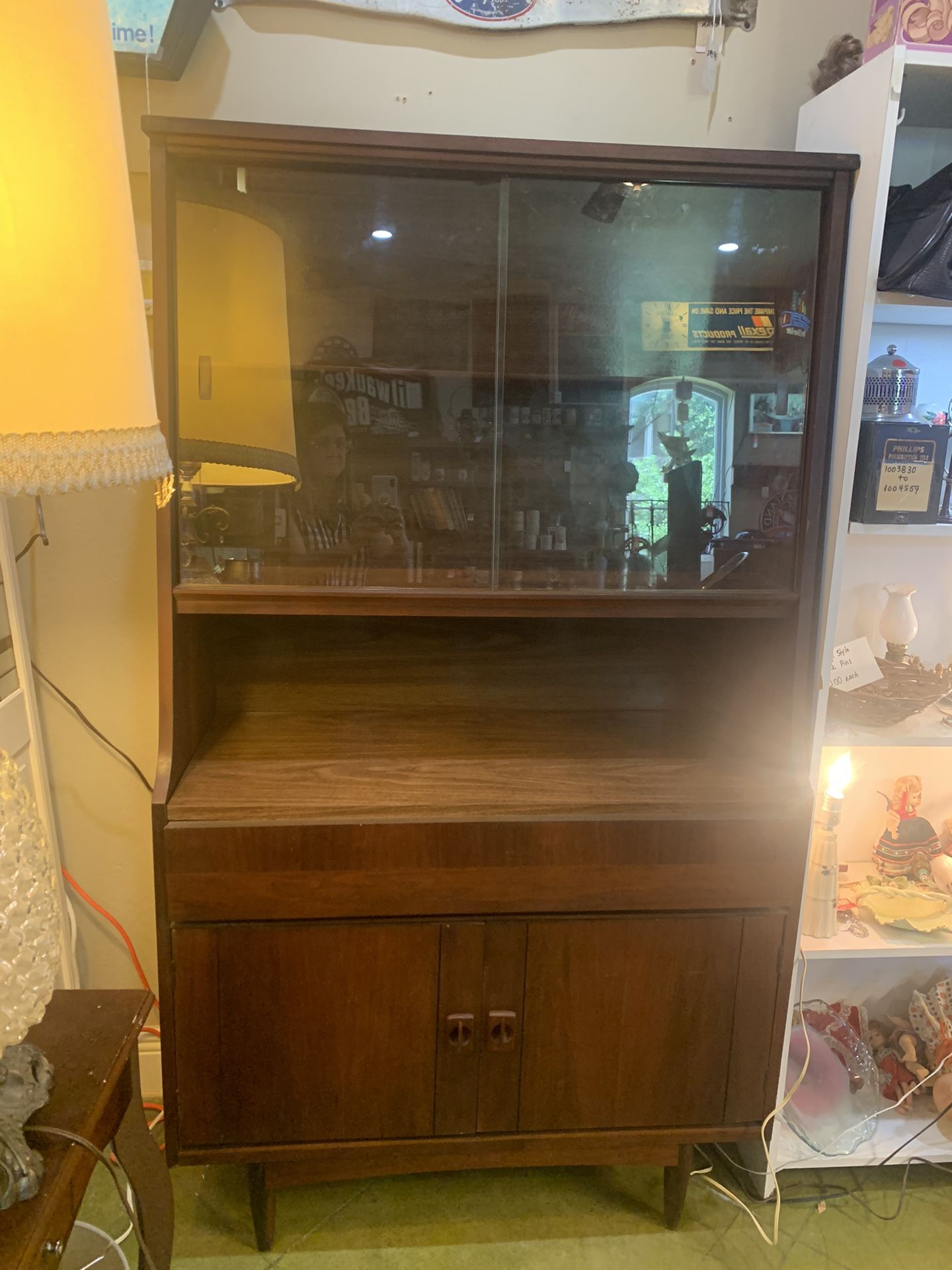 38x16x67 vintage wood and glass doors hutch, buffet, China cabinet, shelving, glass doors, storage or bar. 325.00.  Johanna at Antiques and More. Loca