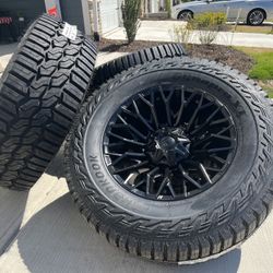 8x170 Fuel Strike Blackout Rims on 37x13.50R20 Hankook Dynapro XT RC10 Tires