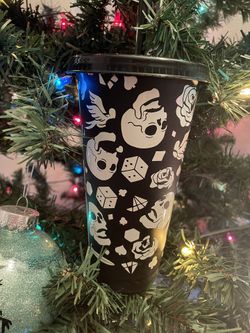 black cup with skulls 