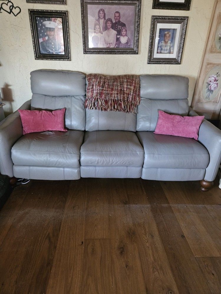 Leather Couch And Loveseat. 4 Recliners And Charging Plugs On Ends