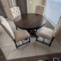 Table And Four Chairs 