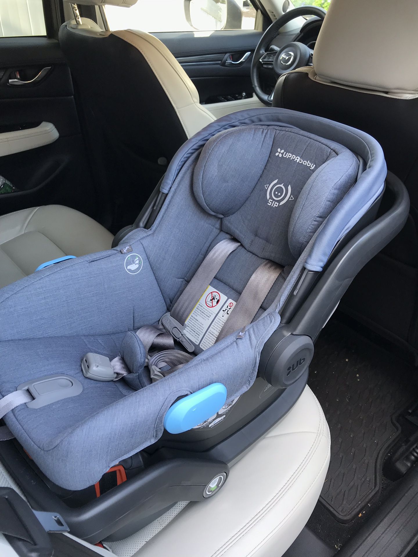 UPPAbaby Mesa Infant car seat and a travel bag