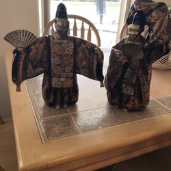 Two Asian Motif Statues