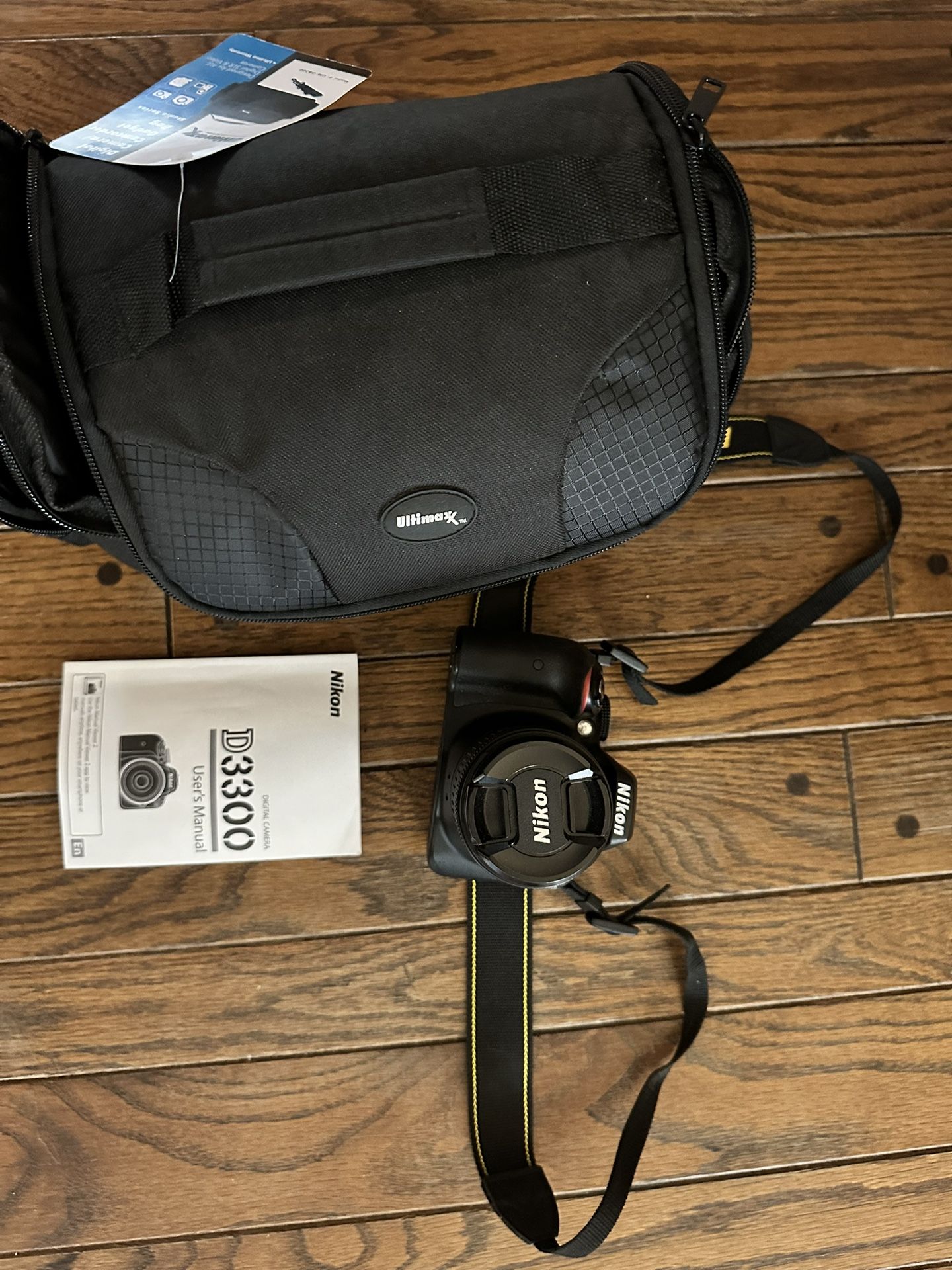Nikon D3300 with case with 18-55mm lens