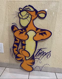 Tigger painted on plexiglass Needs cleaned / Scratches 18”W x 30”H $20