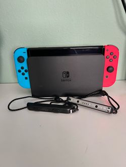 Nintendo Switch OLED + Mario Party. Like New, Barely Used (2 unused codes)