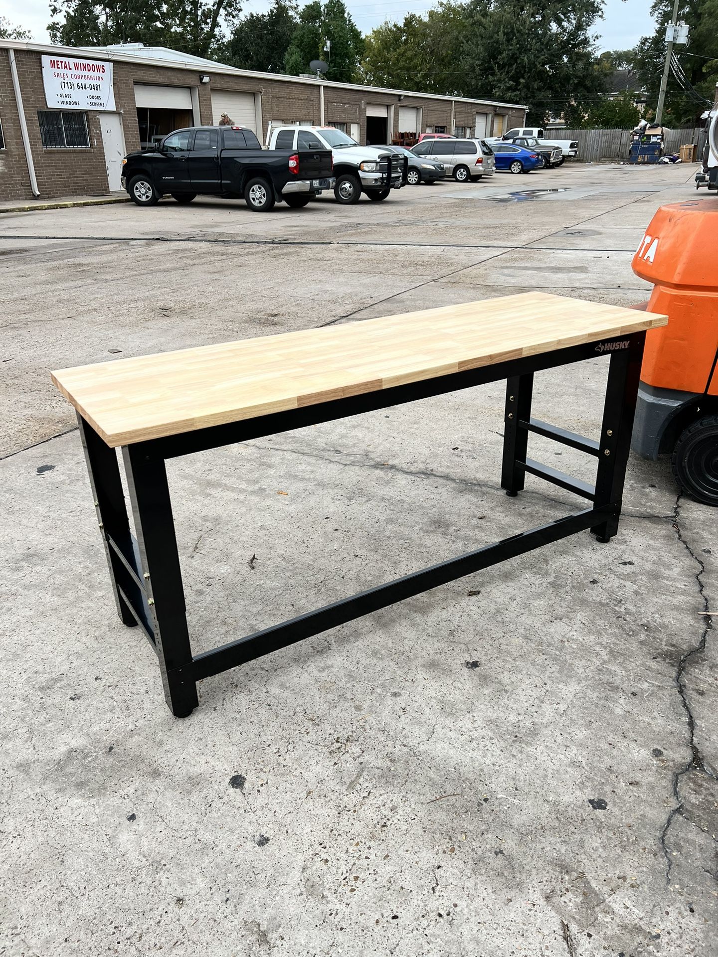 Husky 6 ft. Adjustable Height Solid Wood Top Workbench in Black for