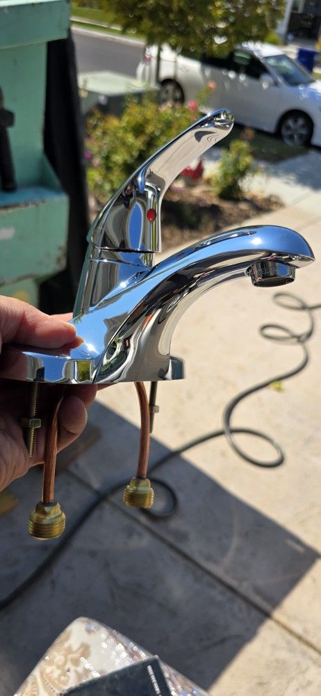 Brand New Silver Sink Faucet