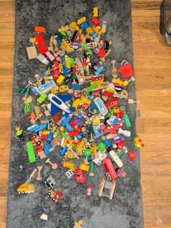 Plan toy vehicles people signs and trees