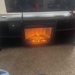 Electric fireplace with shelves