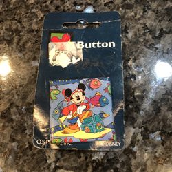 Vintage Disney Mickey Mouse Pin Back Pin.  Round shape. From 1985.  The square  pin is 1 1/2 inches wide.  Brand new never removed from original packa