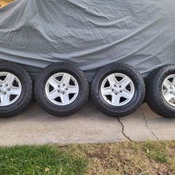 265/70/17  GOODYEAR AT/S with Jeep Wheels $650obo