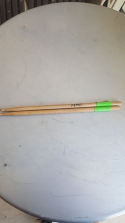Pair of used wood drumsticks