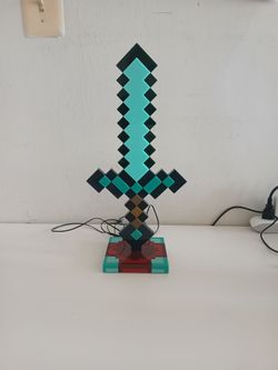 Amazing Minecraft Diamond Sword 14 Inch Desk LED Night Light.
Only 10 dollars.
And i gift a like New Genshin Impact Collection Fashion Acrylic Stand