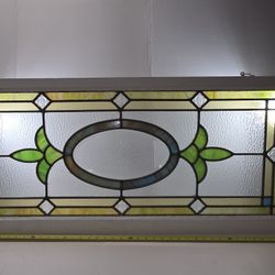 Stained Glass Transom Featuring A Beveled Oval Center Piece
