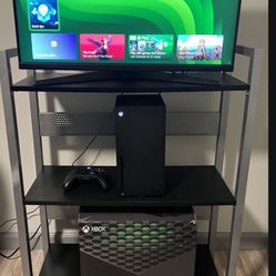 Xbox SeriesX System / Console - Works Great - Games - Includes Cables And Controller - System has sent on the bottom of the system- Willing to trade f