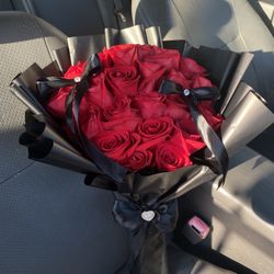 25 red roses with bows