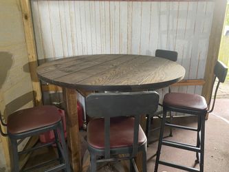 Strong wooden table with 4 stools. 2 sets. 175.00 a set.