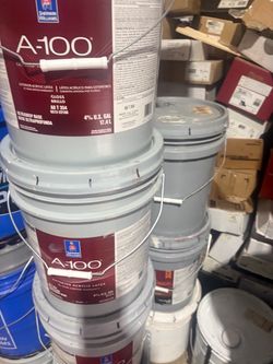 Quality exterior paint in dark grey $60 per bucket