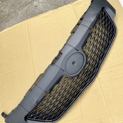 2009-10 TOYOTA COROLLA FRONT BUMPER UPPER GRILLE ASSEMBLY — NEW