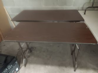 Selling 3 foldable wood tables and 1 white top plastic table
