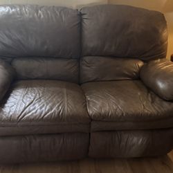 Leather reclining loveseat