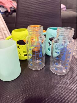 2 - 4oz dr brown glass bottles with 4 sleeves