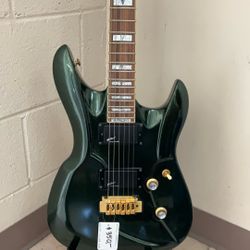 SWITCH VIBRACELL ELECTRIC GUITAR WITH CASE.