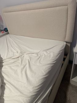 Cream full size upholstery bed