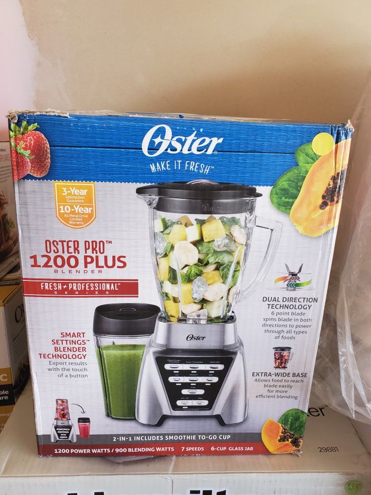 New oster pro 1200 plus blender includes smoothie cup