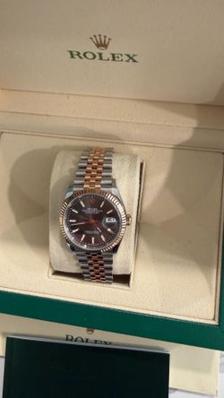 Model Number: 126231 Rolex Datejust 36mm grey slate Index Dial Two Tone Everose Gold Fluted Bezel Jubilee Bracelet  Is great condition bought from the