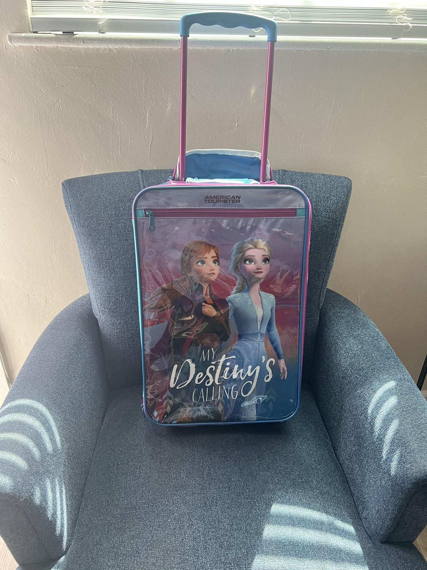 American Tourister kids rolling luggage