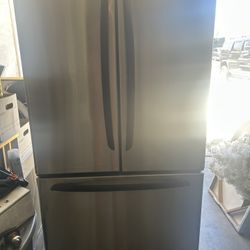 Kenmore  Refrigerator $100  For a Garage 