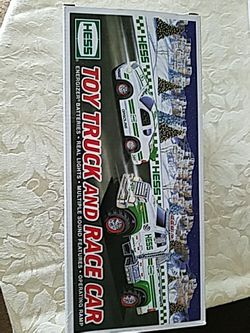 2,Hess Trucks. Helicopter and Race car.