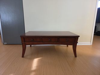 3 drawer wooden coffee table - $25 OBO