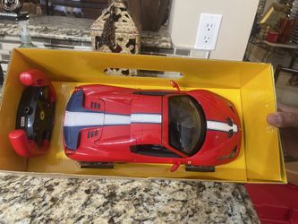Ferrari and Blue and White Remote Control Car