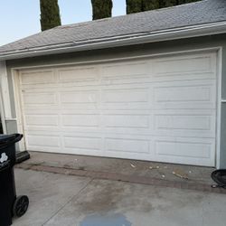 Detached Garage with Manual Roll-Up Door – Great for Storage or Project Use