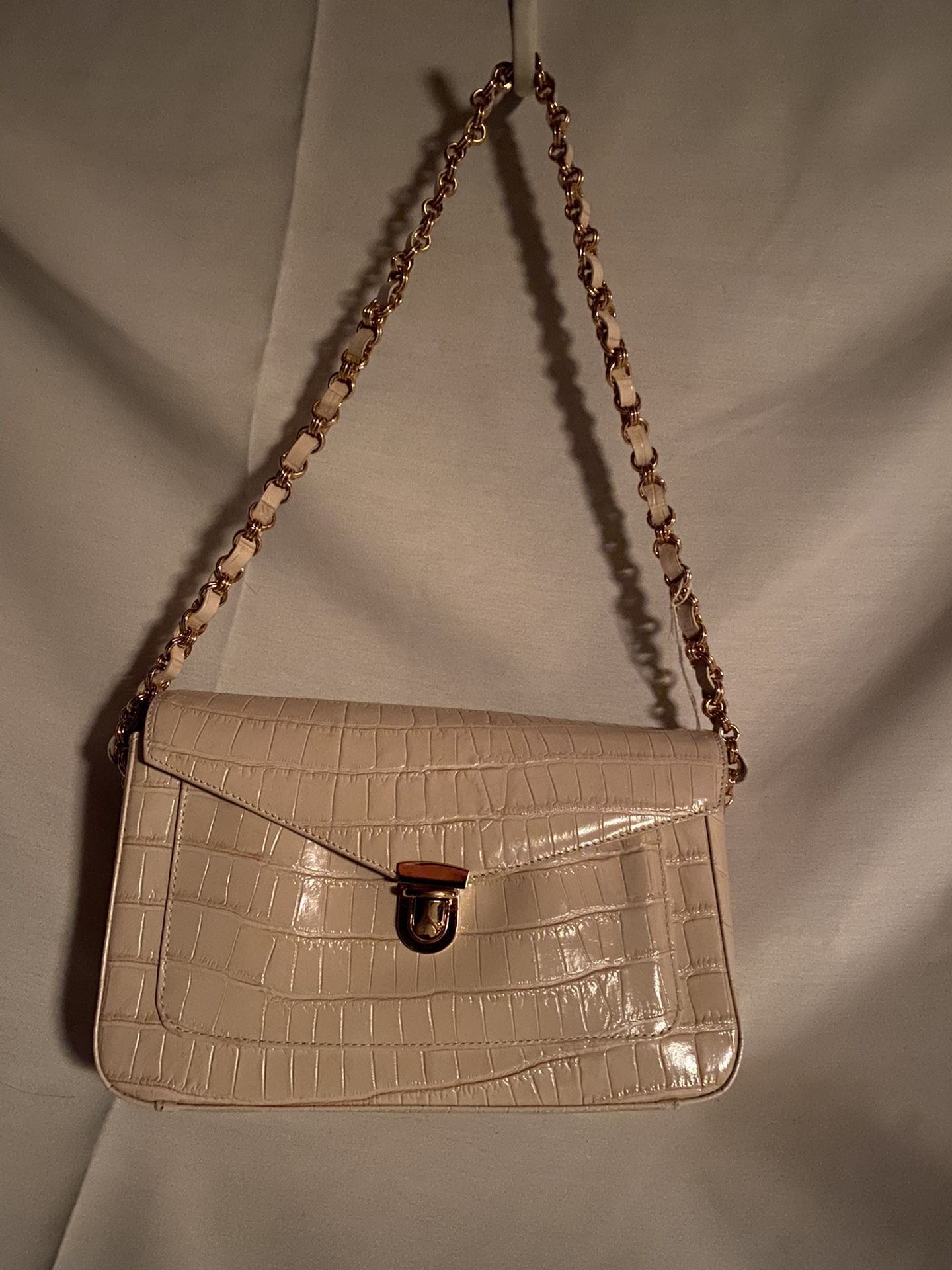 Bloomingdales off white purse with gold chain strap