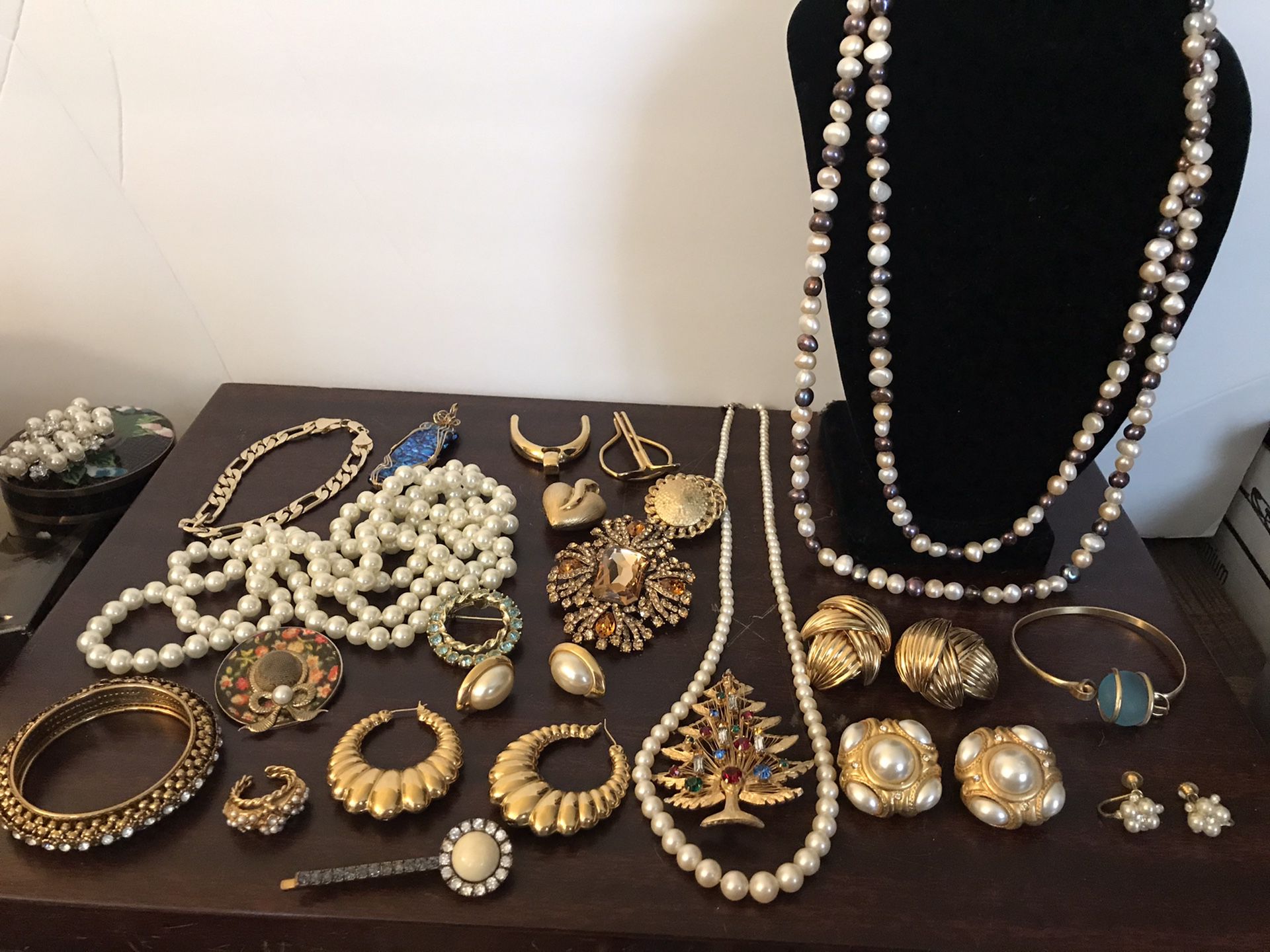 Large rhinestone gold tone pin $25, pearl earrings $10 each, goldtone chain bracelet $15 all the rest is on next ad