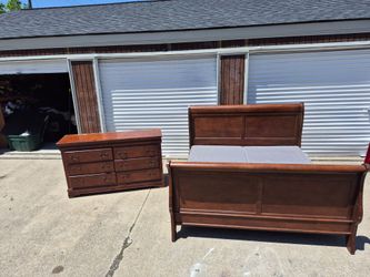 Nicely designed king size sleigh bed