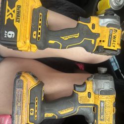 Two Dewalt Impact Drivers W/ Batteries 