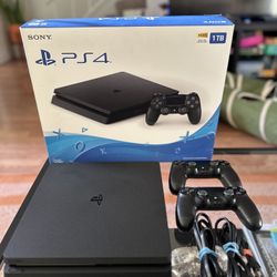 Like New PS4 with controllers and games