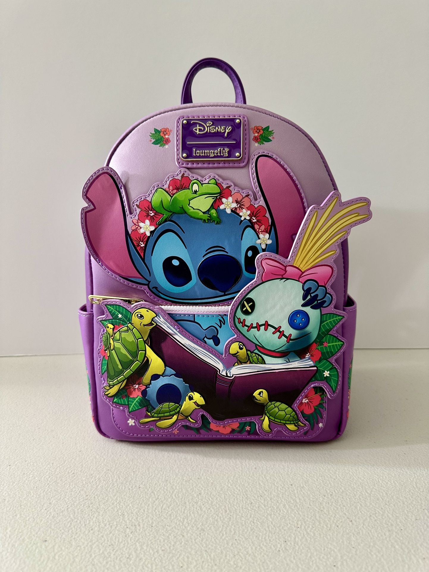 BRAND NEW WITH TAGS. DISNEY LILO & STITCH READING BOOK MINI LOUNGEFLY BACKPACK FOR SALE. EXCLUSIVE. 