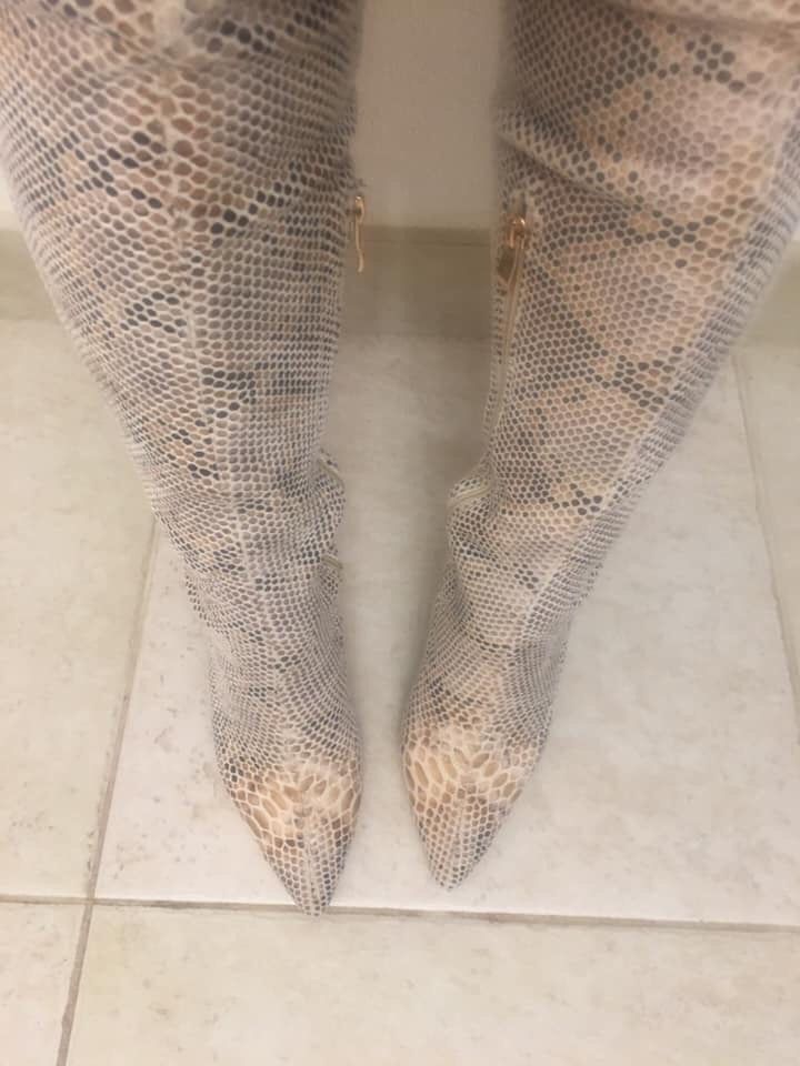 Lightly used snake skin thigh high boots