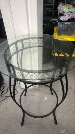 Tall glass top metal table