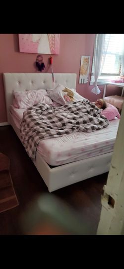 White faux leather bed