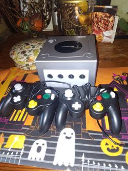Complete with cords game cube with 2 controllers and 2 games ty 2 & baeblade for $150